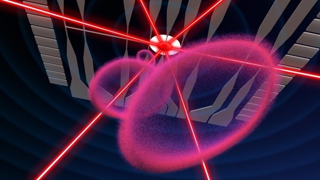 Inside NASA’s Cold Atom Lab, scientists form bubbles from ultracold gas, shown in pink in this illustration. Lasers, also depicted, are used to cool the atoms, while an atom chip, illustrated in gray, generates magnetic fields to manipulate their shape in combination with radio waves. Credit: NASA/JPL-Caltech
