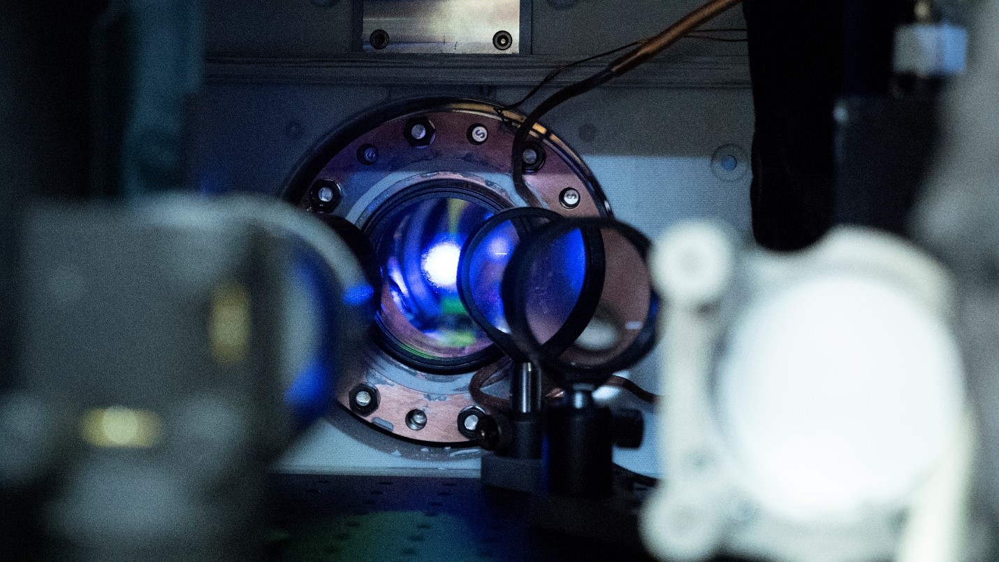 JILA researchers measured time dilation, or how an atomic clock's ticking rate varied by elevation, within this tiny cloud of strontium atoms. Credit: R. Jacobson/NIST