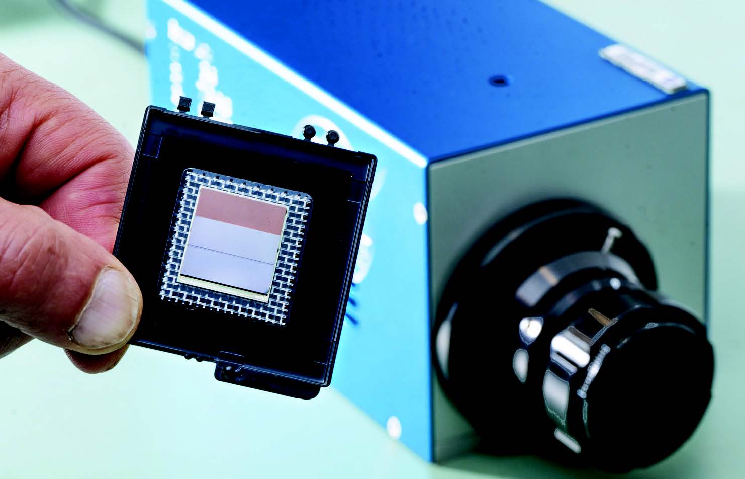 Goddard engineer Murzy Jhabvala holds the heart of his Compact Thermal Imager camera technology – a highresolution, high-spectral-range infrared sensor suitable for small satellites and missions to other solar system objects. Credit: NASA Goddard