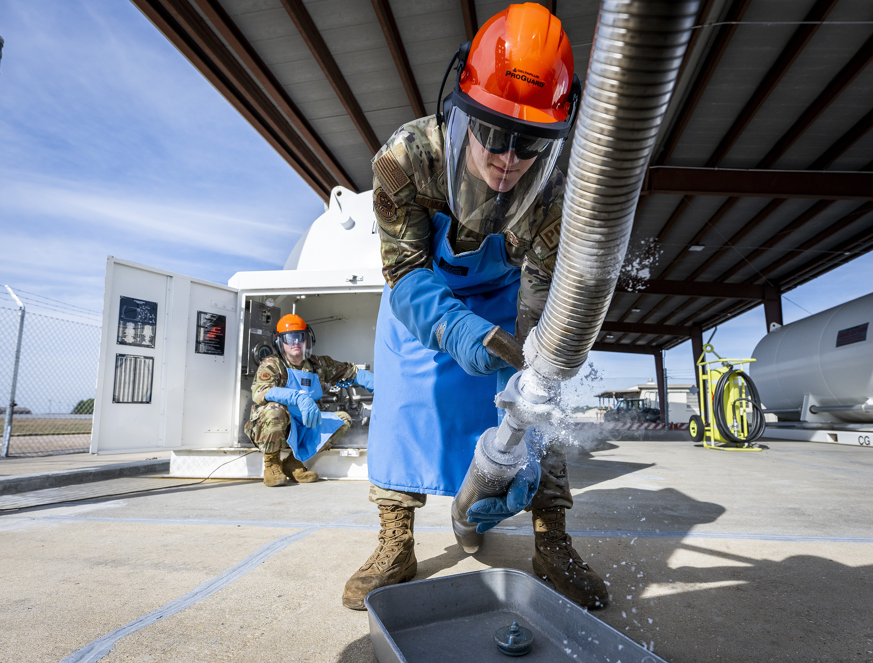 Image: Senior Airman Fred Stamatatos, 96th Fuels Management Flight, begins to detach the liquid nitrogen pipes after a transfer Dec. 7 at Eglin Air Force Base, Florida. The Airmen in charge of Eglin’s cryogenic storage saw a 1,400 % increase in their intake and output of liquid nitrogen over a three-month period due to a climatic munitions test. The team issued 19,000 gallons compared to an average of 2,100 cryogenic fuels during that window. Credit: U.S. Air Force photo/Samuel King Jr.