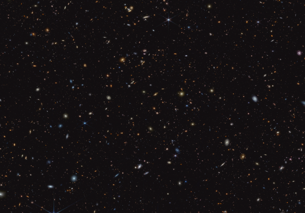 This infrared image from NASA’s James Webb Space Telescope (JWST) was taken for the JWST Advanced Deep Extragalactic Survey, or JADES, program. It shows a portion of an area of the sky known as GOODS-South, which has been well studied by the Hubble Space Telescope and other observatories. More than 45,000 galaxies are visible here. Credits: NASA, ESA, CSA, Brant Robertson (UC Santa Cruz), Ben Johnson (CfA), Sandro Tacchella (Cambridge), Marcia Rieke (University of Arizona), Daniel Eisenstein (CfA). Image processing: Alyssa Pagan (STScI) Download the full-resolution version from the Space Telescope Science Institute.