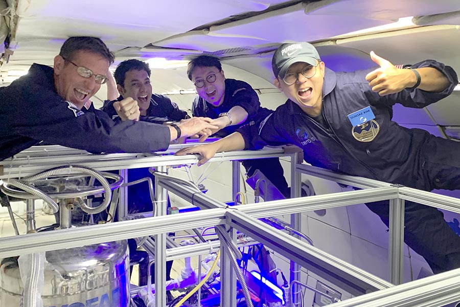 Issam Mudawar (far left) oversees an experiment to test how microgravity affects cryogenic liquids, which is vital to the future operation of space-based propellant depots. (Purdue University photo/Jared Pike)